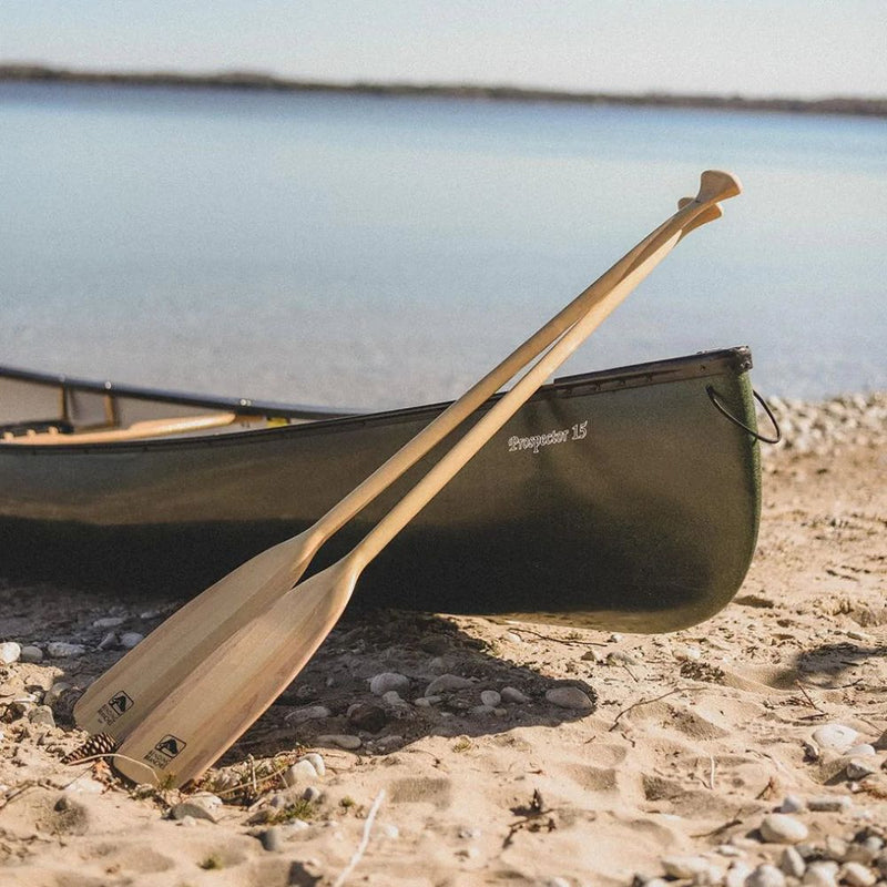 Bending Branches Loon Canoe Paddle leaning up against canoe