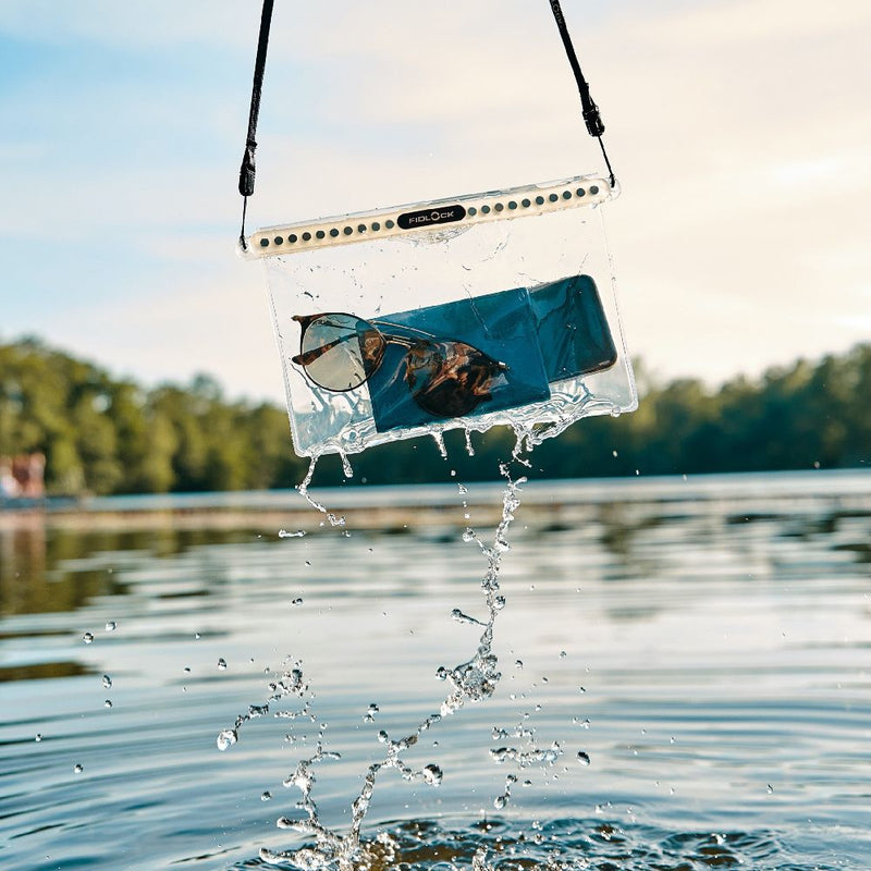 Fidlock Hermetic Dry Bag Multi petrol transparent in use on lake